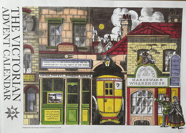 Printed card advent calendar showing a Victorian street with shopfronts and businesses